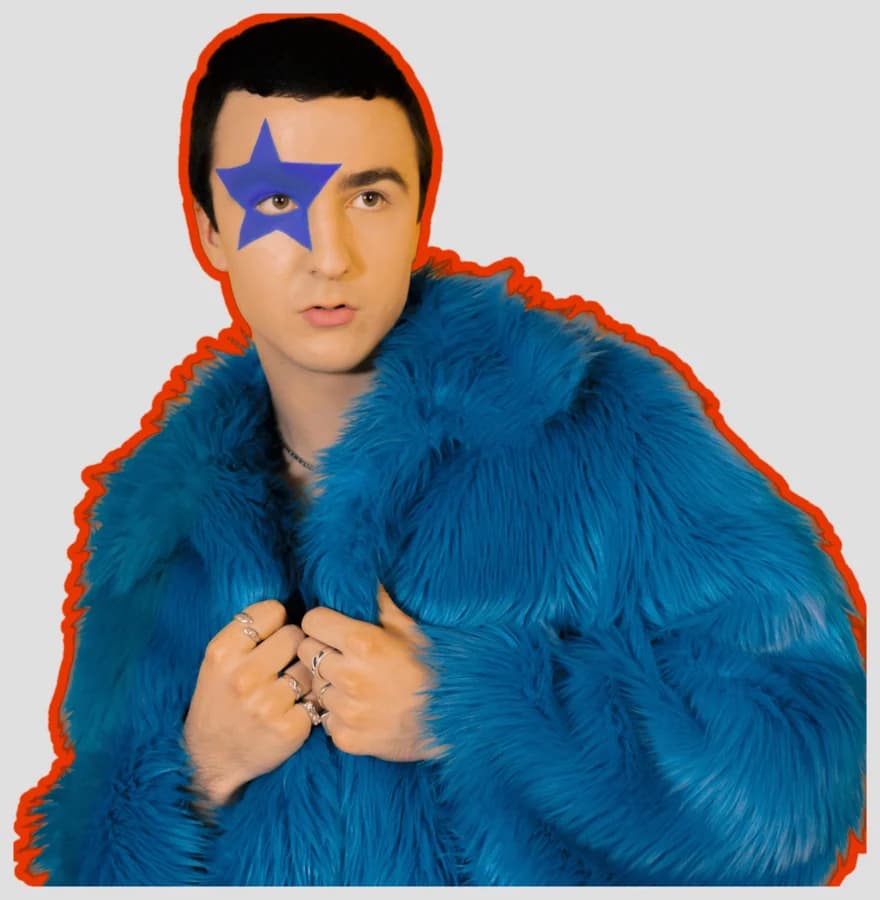 COSMÓ in a blue fur coat